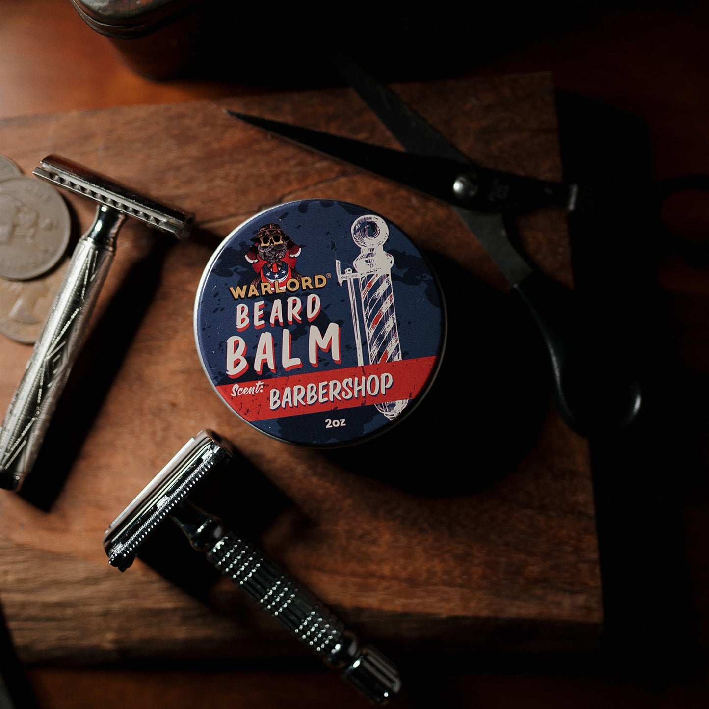 Warlord natural Barbershop beard balm tin with classic safety razors and barber scissors – natural beard balm for men’s grooming, vintage masculine style.