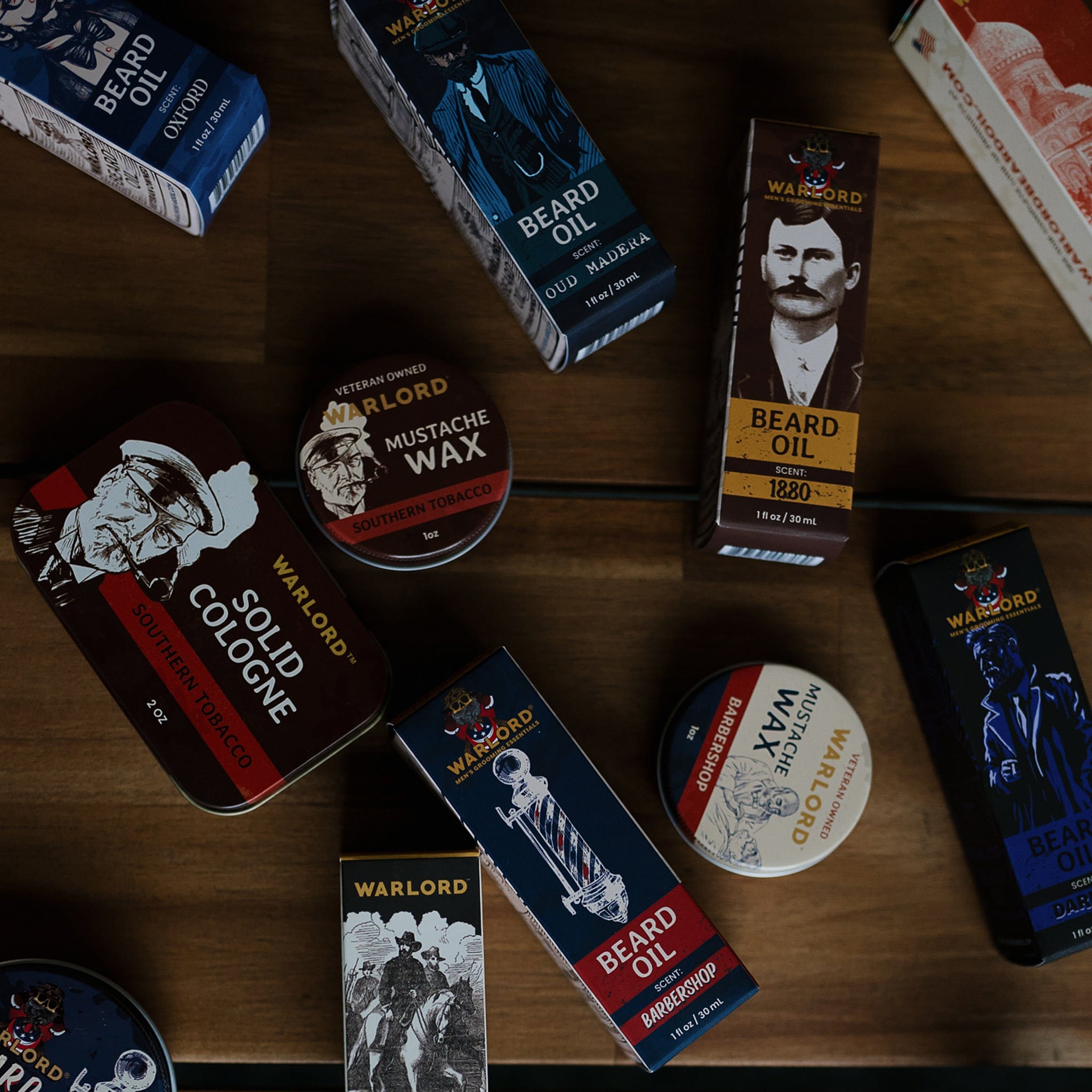 Assorted Warlord Beard Oil products arranged in a flat lay display