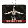Decorative tag with a vintage-style illustration of a man with guns and text 'You're a Daisy if you do' on a dark background. Doc Holiday.
