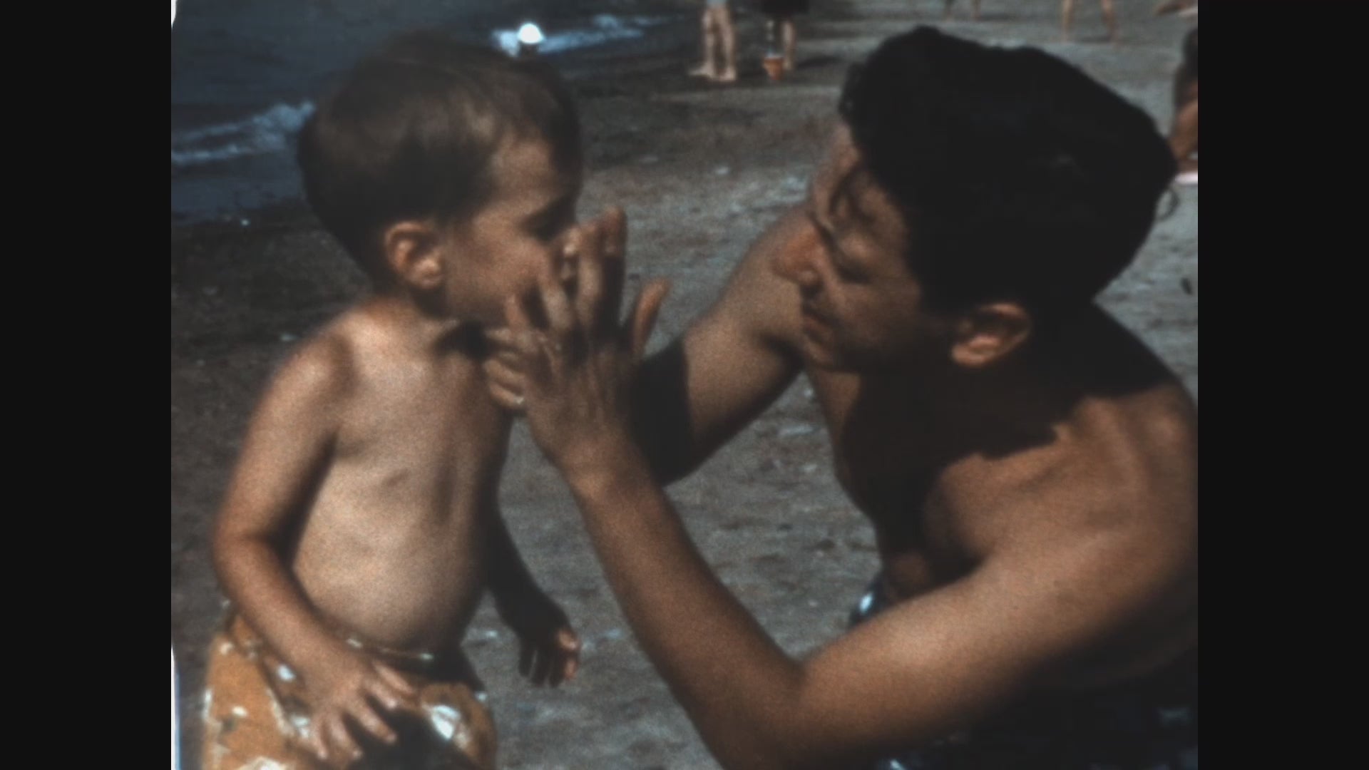 Load video: Dad and son on the beach in 1955.