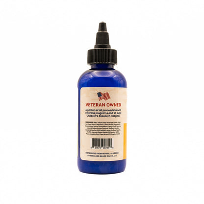 Warlord shaving lotion bottle side label showing veteran owned and St. Jude charity support – premium men’s grooming.